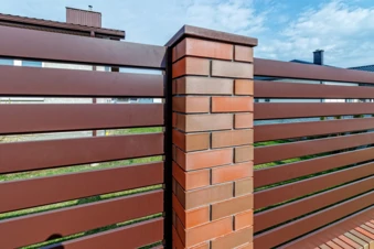 fragment-modern-fence-lined-with-decorative-bricks-old-style